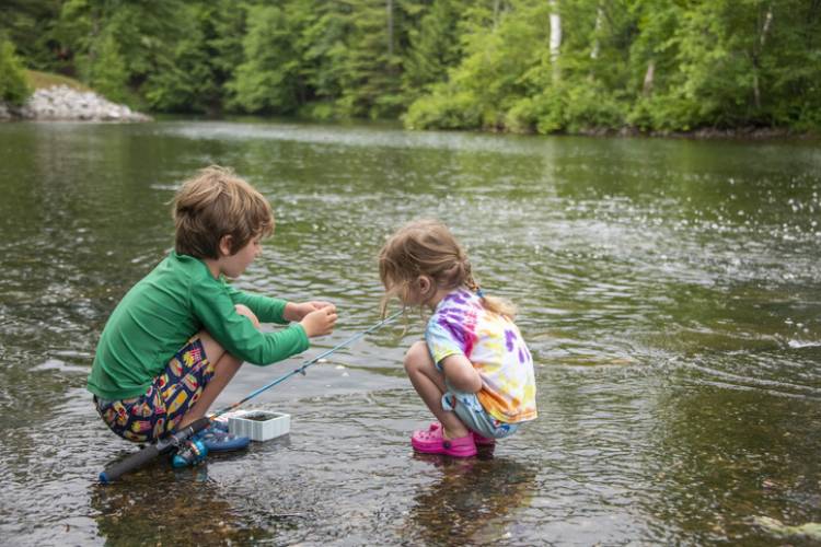 Children fish near Killington, Vermont