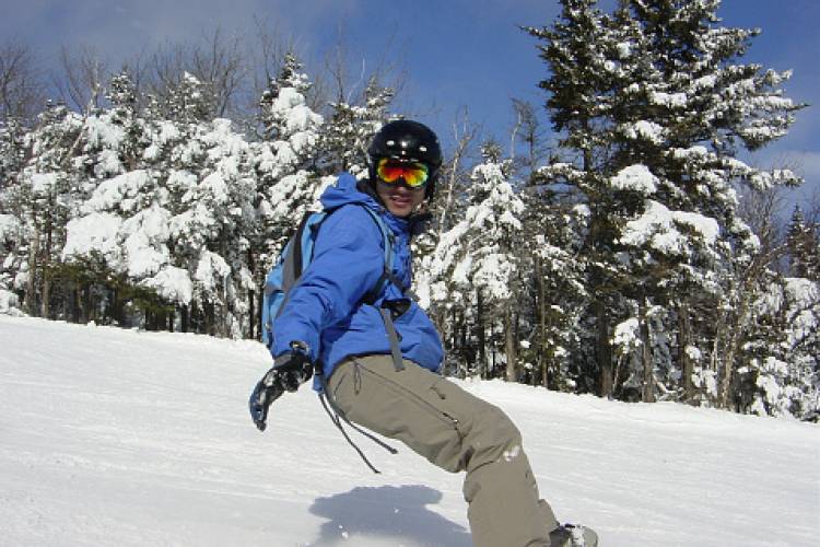 A snowboarder at the Okemo Mountain Resort